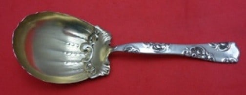 Whiting Rose and Scroll Sterling Silver Berry Spoon Goldwashed 7.5": Whiting Rose and Scroll Sterling Silver Berry Spoon Goldwashed 7.5" This exquisite serving spoon features the elegant Rose and Scroll pattern by Whiting. Crafted from sterling silver and goldwashed, t