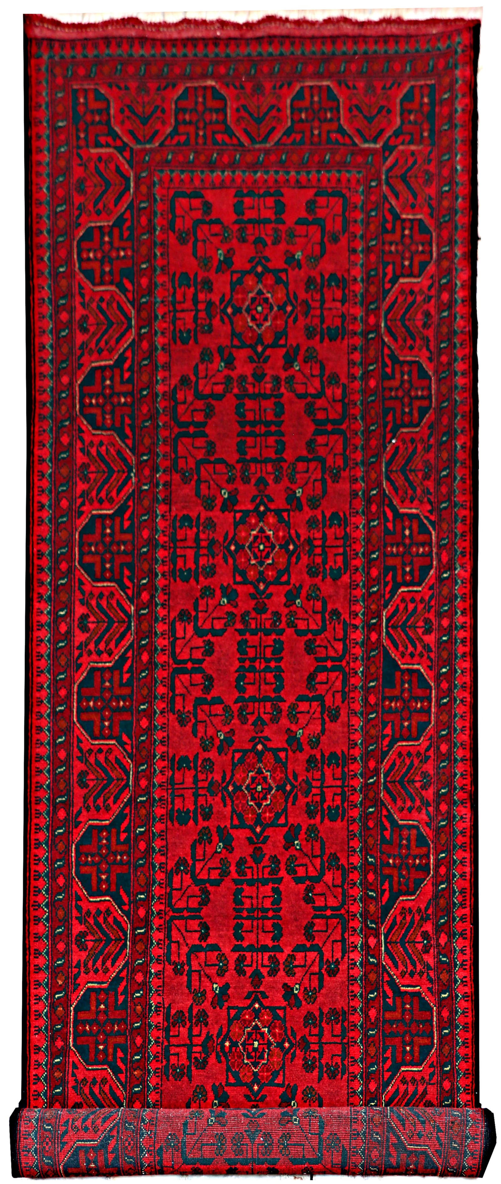 Hand-Knotted 2.9 x 9.7 Dark Red Afghan Khal Mohammadi Tribal Rug: Hand-Knotted 2.9 x 9.7 Dark Red Afghan Khal Mohammadi Tribal Rug Free continental US Shipping Discover the beauty of this hand-knotted Afghan Khal Mohammadi rug, measuring 2.9 x 9.7 feet. Crafted by A
