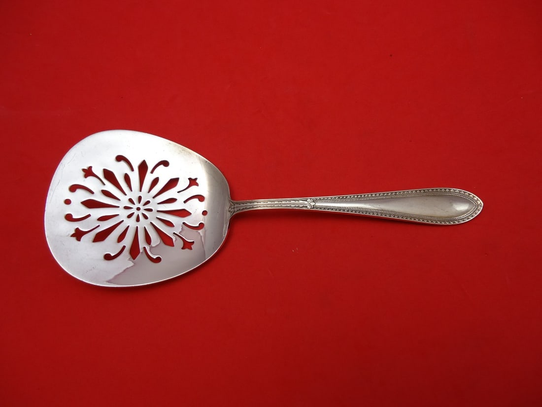 Gorham Edgeworth Sterling Silver Tomato Server Pierced 7 3/4": Gorham Edgeworth Sterling Silver Tomato Server Pierced 7 3/4" This exquisite Edgeworth Tomato Server by Gorham showcases a beautiful pierced design, perfect for serving your favorite dishes. Crafted f