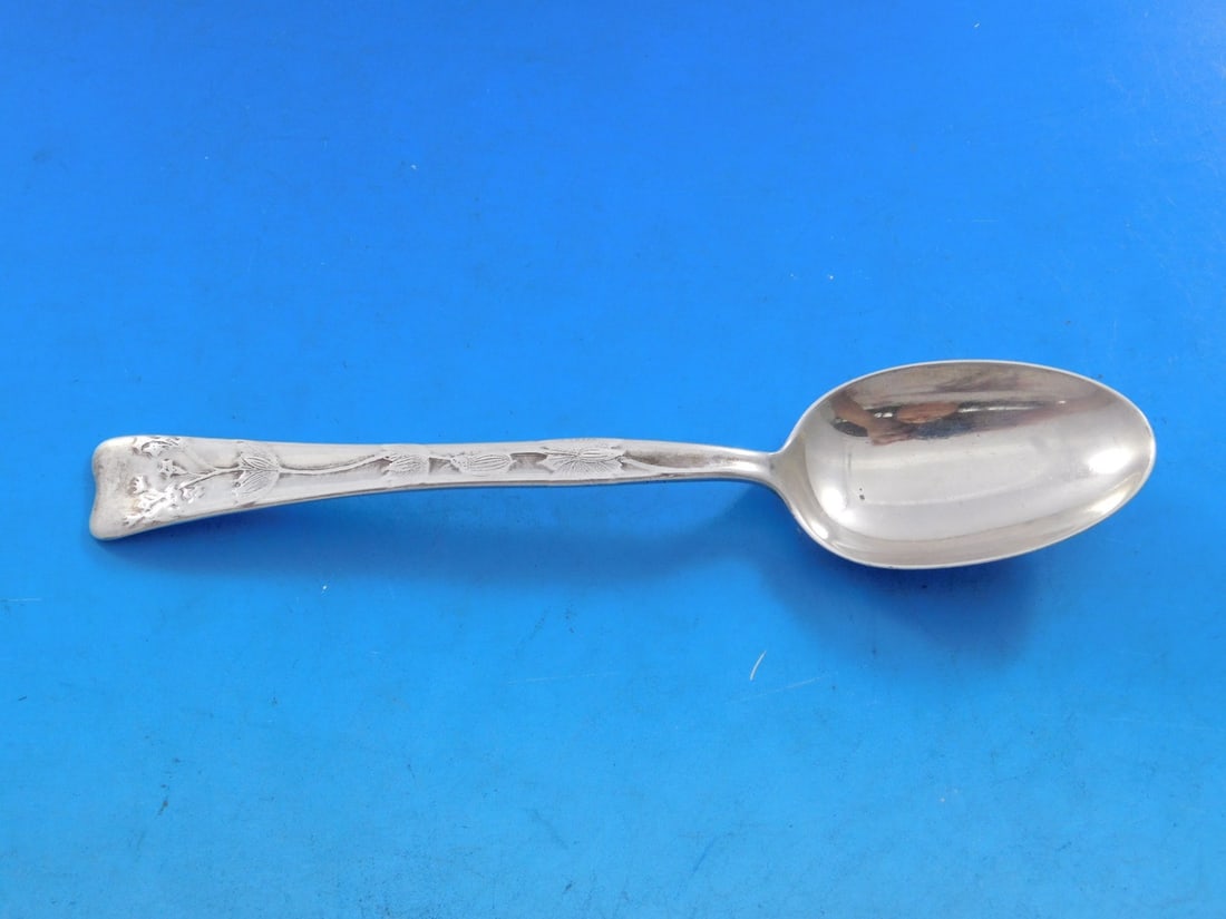 Tiffany & Co. Lap Over Edge Sterling Silver Teaspoon with Poppies 6 in: Tiffany & Co. Lap Over Edge Sterling Silver Teaspoon with Poppies 6 in This exquisite Lap Over Edge Acid Etched Sterling Silver Teaspoon by Tiffany & Co. features a beautiful floral design of poppy fl