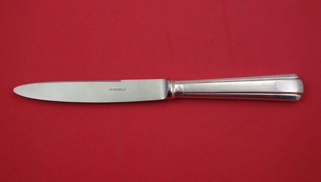 Puiforcat Cyperus Sterling Silver Dinner Knife 9.5 Inch: Puiforcat Cyperus Sterling Silver Dinner Knife 9.5 Inch This stunning dinner knife from the Cyperus pattern by Puiforcat is crafted from high-quality sterling silver. It features a pointed blade, meas