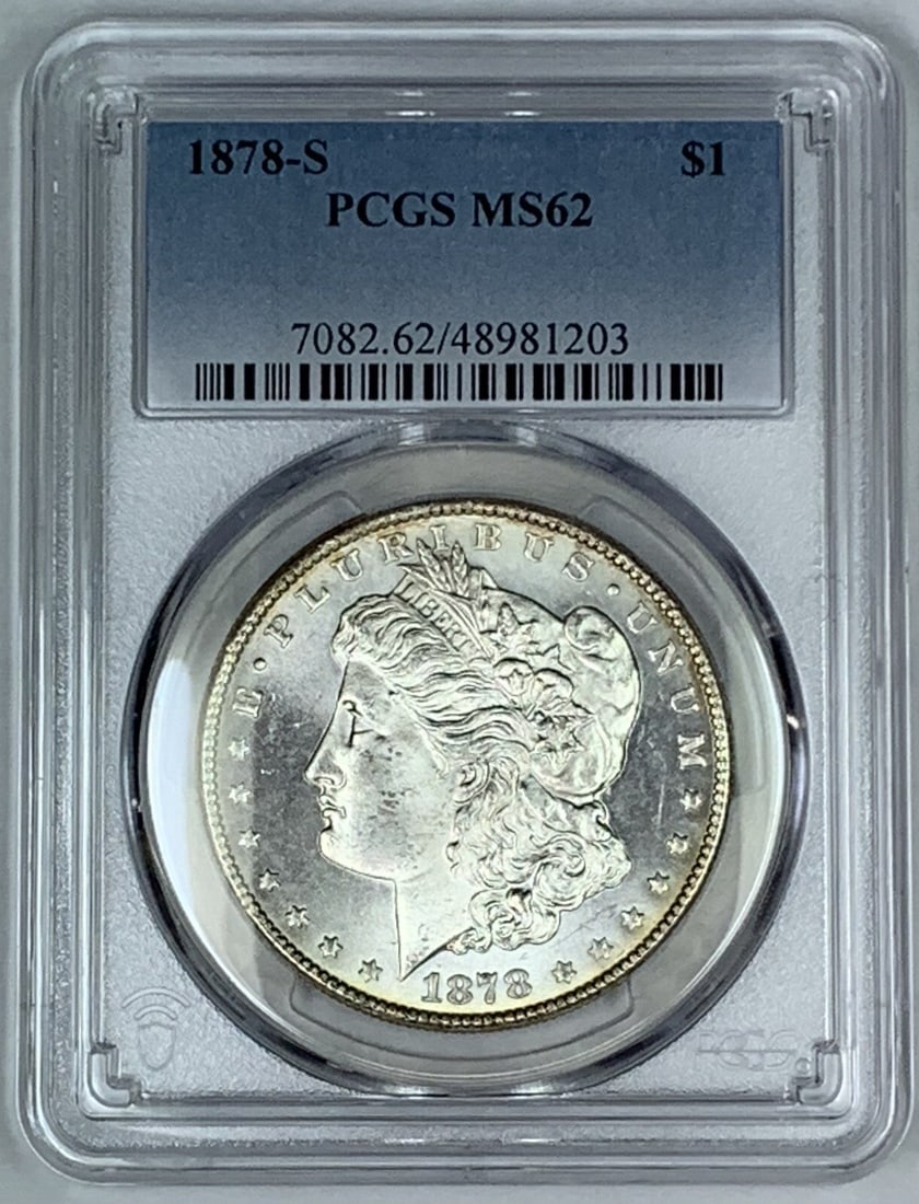 PCGS MS 62 1878-S Morgan Silver Dollar Uncirculated $1 Coin: PCGS MS 62 1878-S Morgan Silver Dollar Uncirculated $1 Coin This 1878-S Morgan Silver Dollar is a United States coin graded MS 62 by PCGS. Composed of silver, this uncirculated coin features the iconi