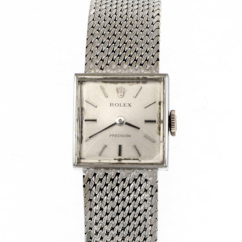 Rolex Vintage 18k White Gold Ladies Manual Wind Square Watch: Rolex Vintage 18k White Gold Ladies Manual Wind Square Watch Discover the elegance of this authentic vintage Rolex ladies wristwatch, featuring a luxurious 18k white gold construction. The watch showc