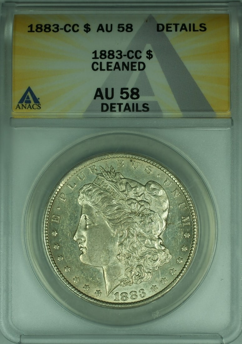 ANACS AU-58 Details 1883 Carson City Morgan Dollar Silver Coin Cleaned: ANACS AU-58 Details 1883 Carson City Morgan Dollar Silver Coin Cleaned This 1883-CC Morgan Silver Dollar is a $1 coin minted in Carson City and graded AU-58 Details by ANACS. It features a silver comp