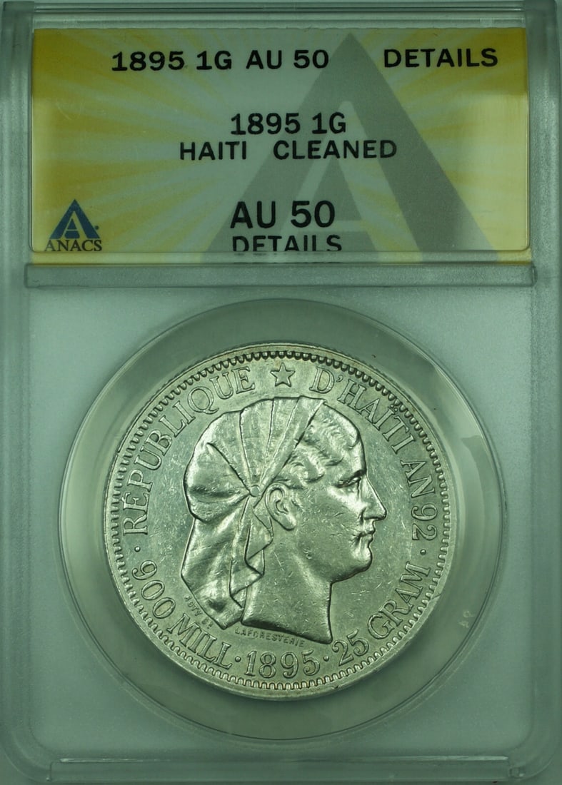 Haiti 1 Gourde Silver 1895 ANACS AU 50 Details KM 46 Cleaned: Haiti 1 Gourde Silver 1895 ANACS AU 50 Details KM 46 Cleaned This is an 1895 1 Gourde silver coin from Haiti, certified by ANACS with a grade of AU 50 Details and noted as cleaned. The coin features a
