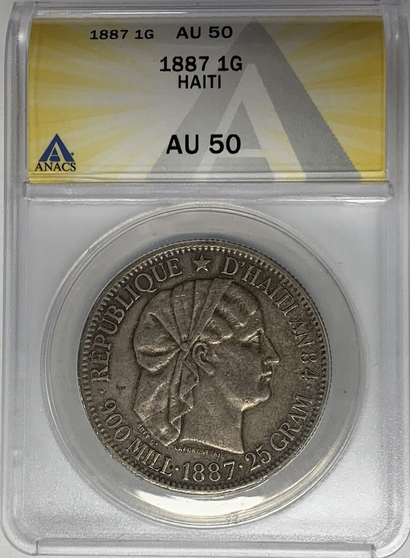 ANACS AU 50 Silver 1 Gourde Haiti Coin 1887 Certified: ANACS AU 50 Silver 1 Gourde Haiti Coin 1887 Certified This is an 1887 Haiti 1 Gourde coin certified by ANACS with a grade of AU 50. The coin is composed of silver and is in circulated condition. It or
