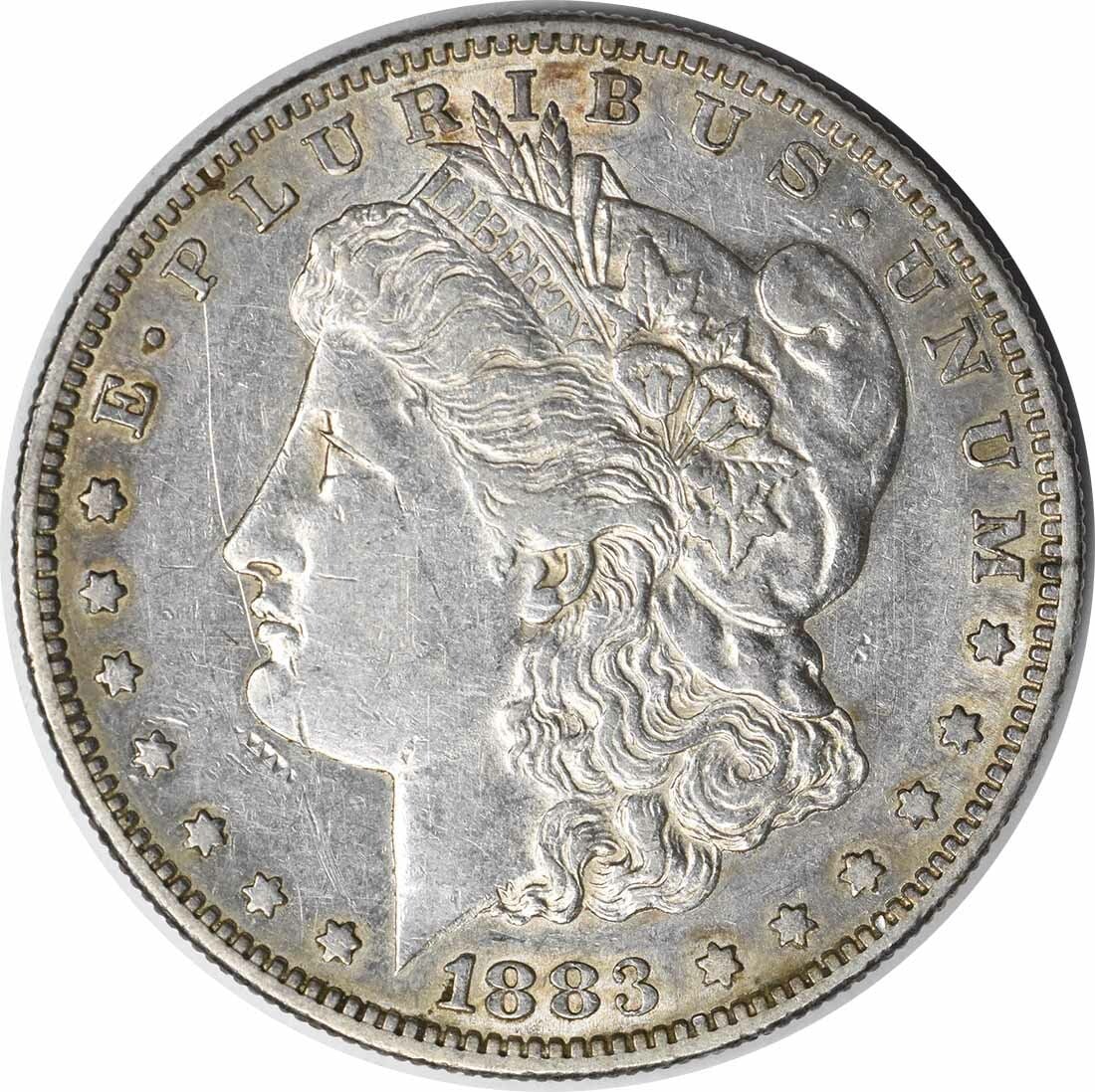 AU Grade 1883 S Morgan Dollar Uncertified US Silver Coin: AU Grade 1883 S Morgan Dollar Uncertified US Silver Coin This 1883-S Morgan Silver Dollar is an attractive example of the classic American coin designed by George T. Morgan. Struck at the San Francisc