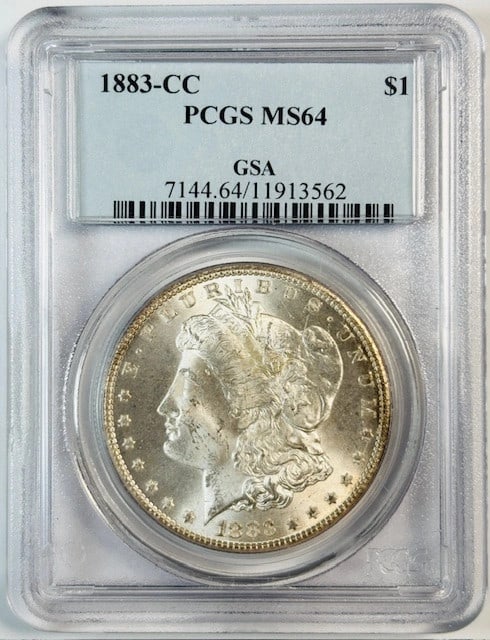 PCGS MS64 1883 Carson City Dollar in GSA Holder: PCGS MS64 1883 Carson City Dollar in GSA Holder This is an 1883 Carson City Morgan Silver Dollar, graded MS-64 by PCGS and housed in its original GSA holder. This uncirculated coin features the iconic