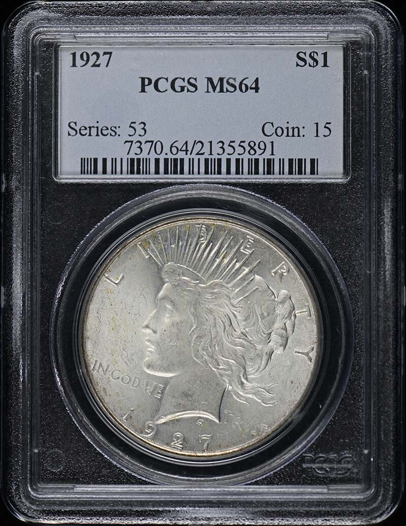 1927 Peace Dollar Uncirculated PCGS MS64 Certified Coin: 1927 Peace Dollar Uncirculated PCGS MS64 Certified Coin This 1927 Peace Dollar is graded MS64 by PCGS, indicating its uncirculated condition. Struck at the Philadelphia Mint, this silver dollar featur
