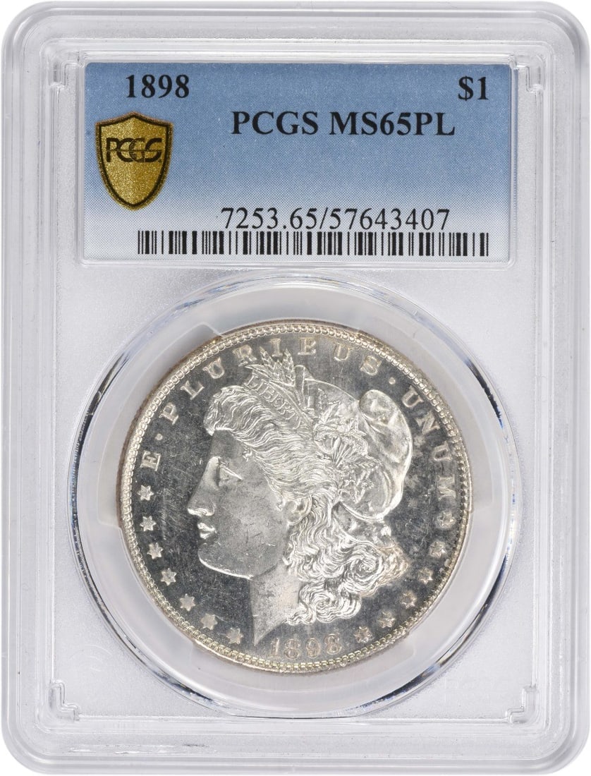 1898 Morgan Silver Dollar MS65PL Uncirculated PCGS Certified: 1898 Morgan Silver Dollar MS65PL Uncirculated PCGS Certified This 1898 Morgan Silver Dollar is a stunning piece of numismatic history, graded MS65PL by PCGS, indicating its exceptional quality and eye