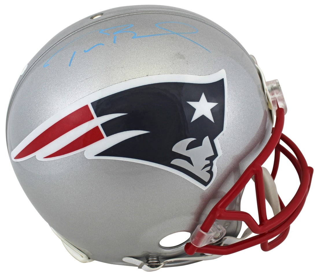 Tom Brady Signed New England Patriots Full Size Proline Helmet with COA: Tom Brady Signed New England Patriots Full Size Proline Helmet with COA This Authentic Full Size Proline Helmet is a must-have collectible for any New England Patriots fan. Personally signed by the le