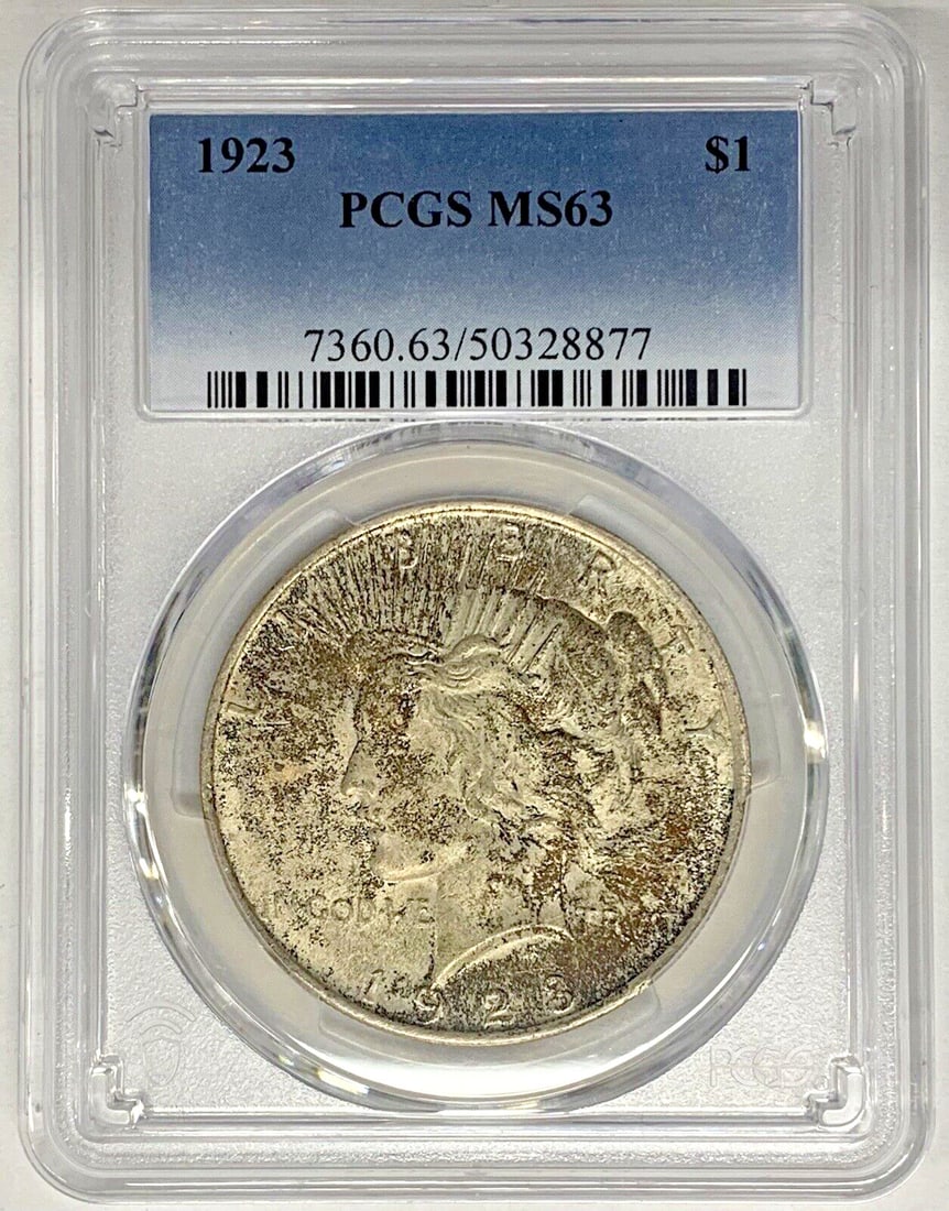 PCGS MS 63 Toned 1923 Peace Dollar Silver Uncirculated Coin: PCGS MS 63 Toned 1923 Peace Dollar Silver Uncirculated Coin This is a 1923 Peace Silver Dollar coin from the United States. The coin is uncirculated and features a toned finish. It is composed of silv