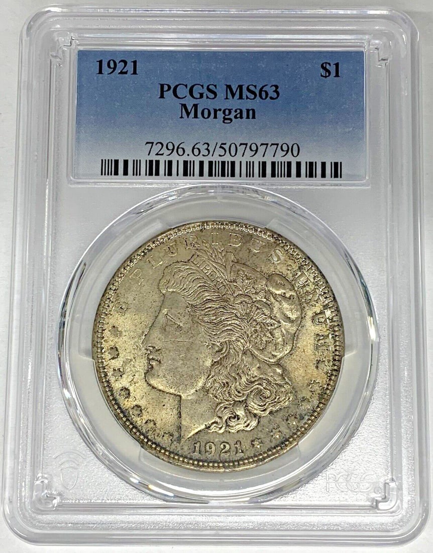PCGS MS 63 1921 Toned Morgan Silver Dollar Uncirculated US Coin: PCGS MS 63 1921 Toned Morgan Silver Dollar Uncirculated US Coin This is a 1921 Morgan Silver Dollar coin from the United States, featuring a toned finish. The coin is composed of silver and has been c