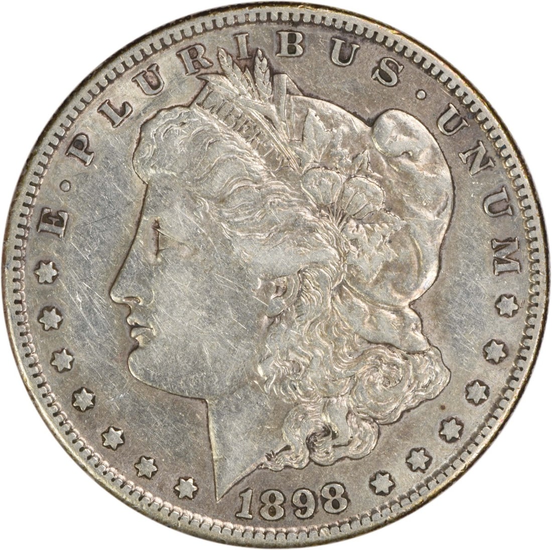 San Francisco 1898 Morgan Dollar EF Condition Uncertified Silver Coin: San Francisco 1898 Morgan Dollar EF Condition Uncertified Silver Coin This 1898-S Morgan Silver Dollar is an uncertified, circulated coin from the United States, minted in San Francisco. Composed of 9