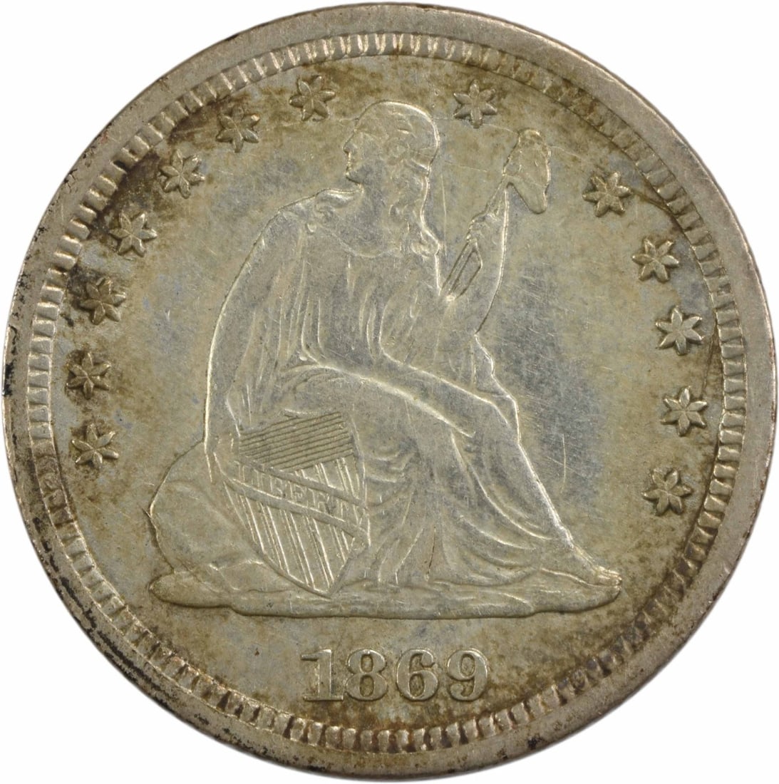 1869-S Liberty Seated Quarter EF 90% Silver San Francisco: 1869-S Liberty Seated Quarter EF 90% Silver San Francisco This 1869-S Liberty Seated Silver Quarter showcases a rich history and intricate design, featuring the iconic Seated Liberty coinage. Crafted