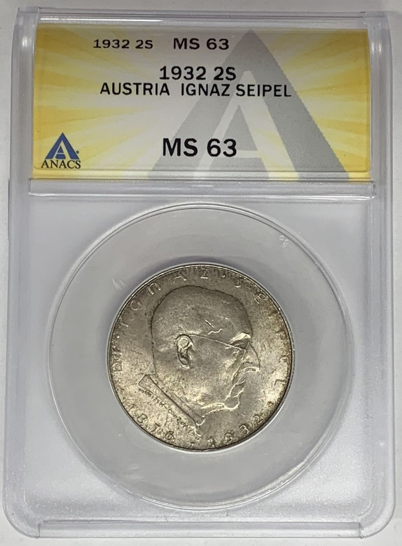 1932 Silver 2 Shilling Austria Coin Graded MS 63 by ANACS: 1932 Silver 2 Shilling Austria Coin Graded MS 63 by ANACS This is a 1932 Austria 2 Shilling coin composed of silver. The coin has been graded MS 63 by ANACS, indicating its high quality and well-prese