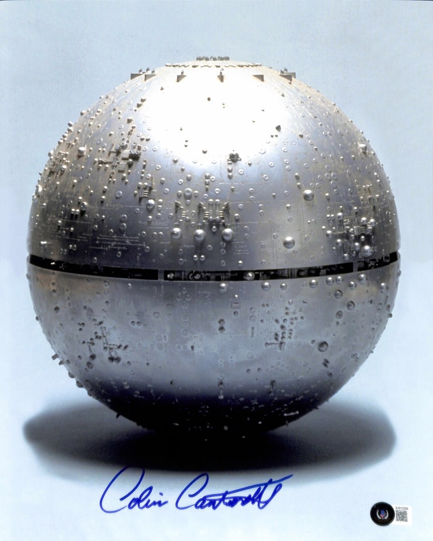 Colin Cantwell Signed Star Wars Death Star 11x14 Photograph Beckett Certified: Colin Cantwell Signed Star Wars Death Star 11x14 Photograph Beckett Certified This stunning 11x14 color photograph features the iconic Death Star, elegantly signed in blue permanent marker by Colin Ca