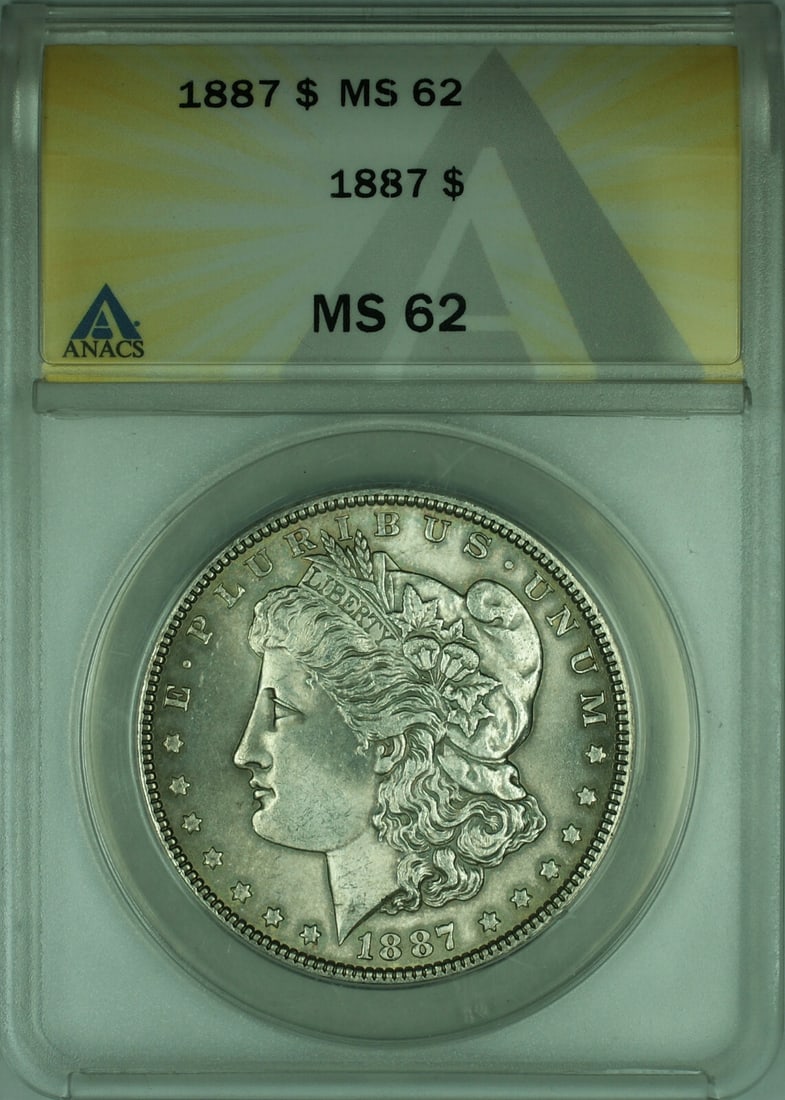 1887 $1 Morgan Silver Dollar ANACS MS62 Certified Philadelphia Mint: 1887 $1 Morgan Silver Dollar ANACS MS62 Certified Philadelphia Mint This is an uncirculated 1887 Morgan Silver Dollar $1 coin from the United States, certified and graded MS-62 by ANACS. The coin is c