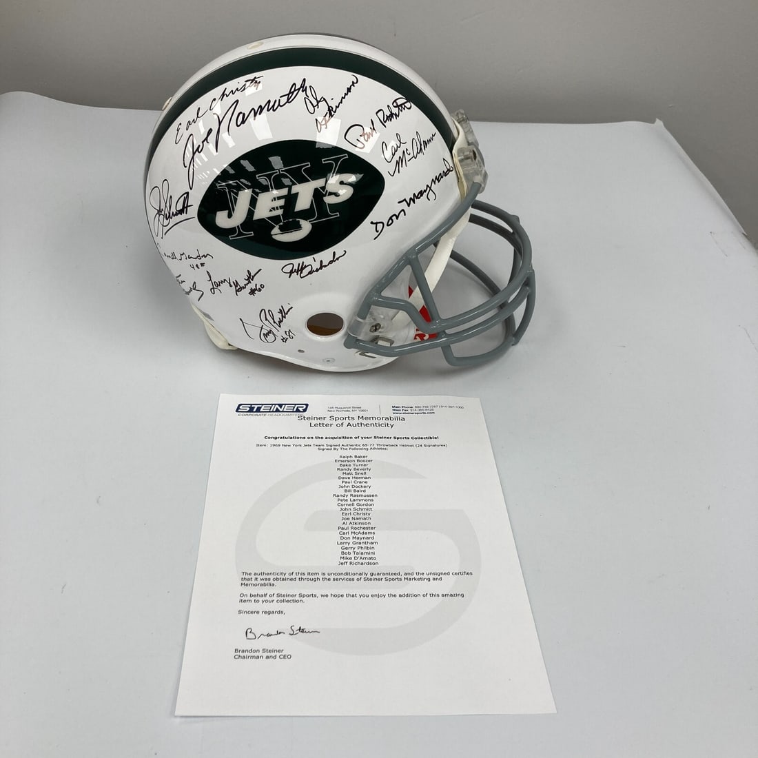 1969 New York Jets Signed Game Helmet with Steiner COA: 1969 New York Jets Signed Game Helmet with Steiner COA This authentic game helmet commemorates the 1969 New York Jets Super Bowl championship team. It is signed by Joe Namath and other team members, p