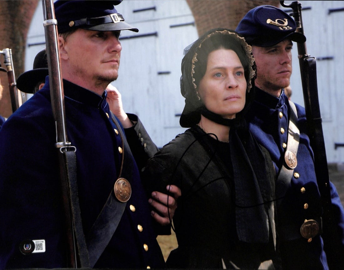 Robin Wright Signed 11x14 Photo The Conspirator Beckett Certified: Robin Wright Signed 11x14 Photo The Conspirator Beckett Certified This autographed 11x14 photograph features actress Robin Wright, known for her role as Mary Surratt in the film "The Conspirator." The