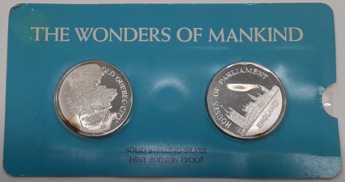 Pair of 1972 Franklin Mint Wonders of Mankind Silver Medals Canada and England: Pair of 1972 Franklin Mint Wonders of Mankind Silver Medals Canada and England This 1972 Franklin Mint set features two commemorative medals from the Wonders of Mankind series. Each un-used, proof-lik