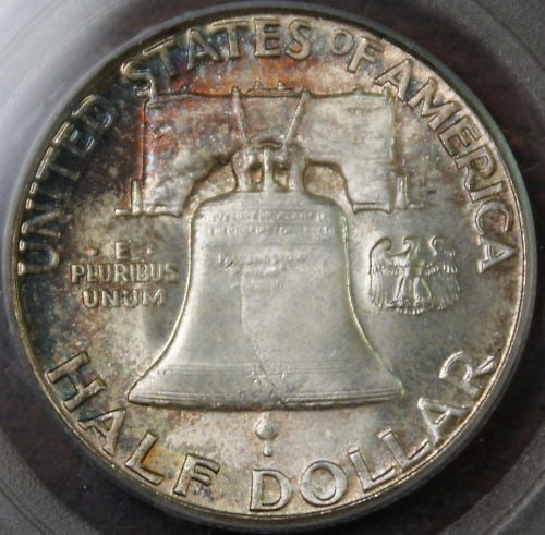PCGS MS-66 1958 Franklin Silver Half Dollar With Colorful Toning: PCGS MS-66 1958 Franklin Silver Half Dollar With Colorful Toning This 1958 Franklin Silver Half Dollar was minted in Philadelphia and certified by PCGS with a grade of MS-66. The coin is uncirculated