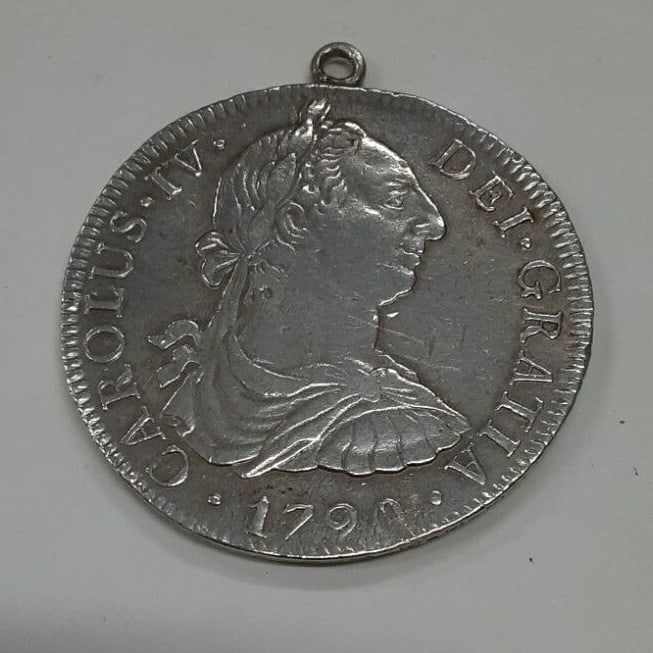 1790 Mexico 8 Reales Silver Charles IV Coin with Loop Extra Fine Cleaned: 1790 Mexico 8 Reales Silver Charles IV Coin with Loop Extra Fine Cleaned This 1790-Mo FM Mexico 8 Reales silver coin was struck at the Mexico City mint during the reign of King Charles IV of Spain. Th