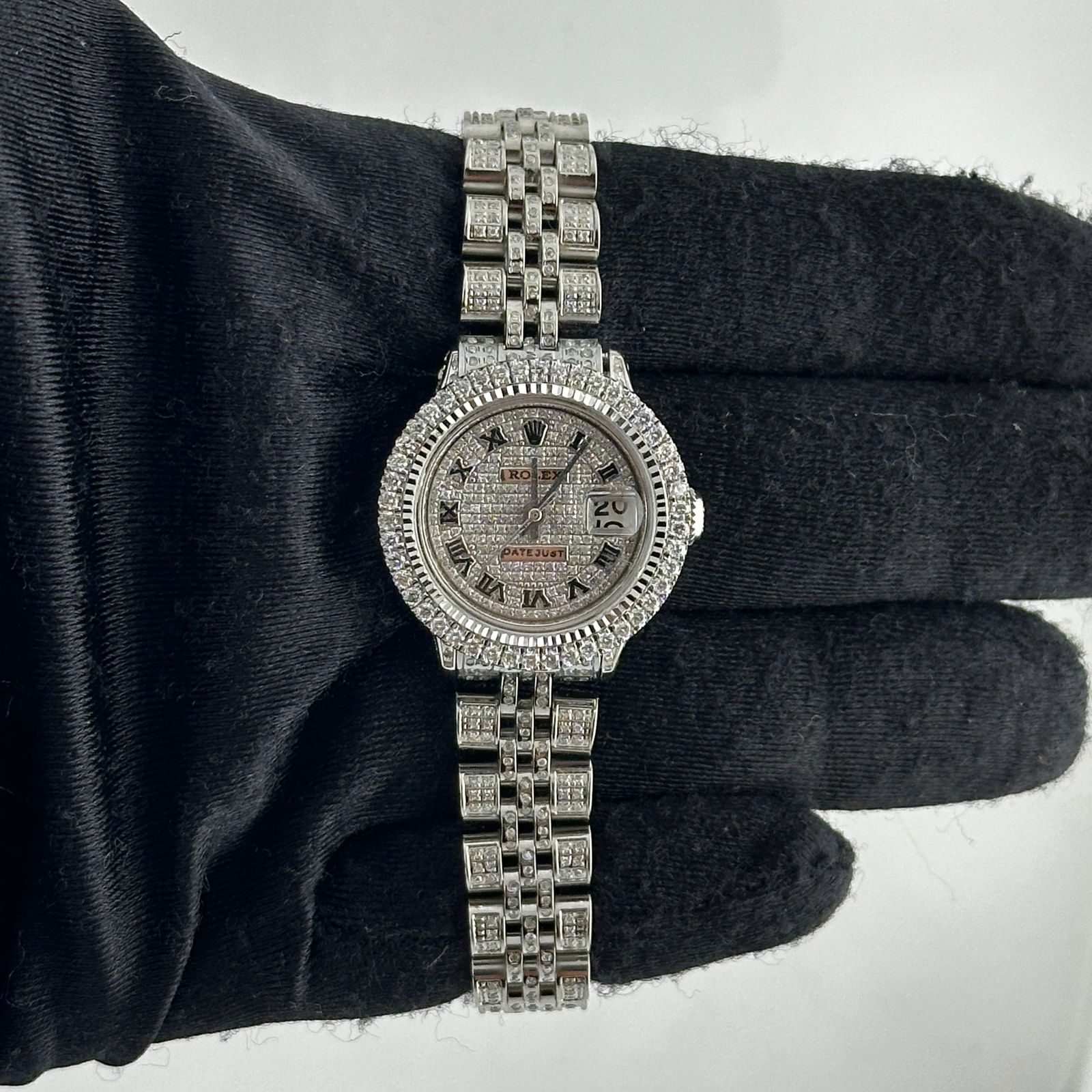 Ladies Rolex Datejust Ref 6517 Aftermarket Diamond Roman Dial Jubilee Watch: Ladies Rolex Datejust Ref 6517 Aftermarket Diamond Roman Dial Jubilee Watch This ladies' Rolex Datejust features an iced-out Roman dial, a prong diamond bezel, and a Jubilee bracelet adorned with diam