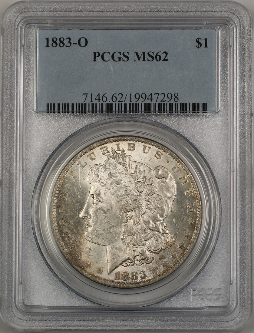 PCGS MS62 1883-O Silver Dollar from New Orleans Lightly Toned: PCGS MS62 1883-O Silver Dollar from New Orleans Lightly Toned This is an 1883-O Morgan Silver Dollar $1 coin, certified by PCGS with a grade of MS 62. The coin is lightly toned and originates from the