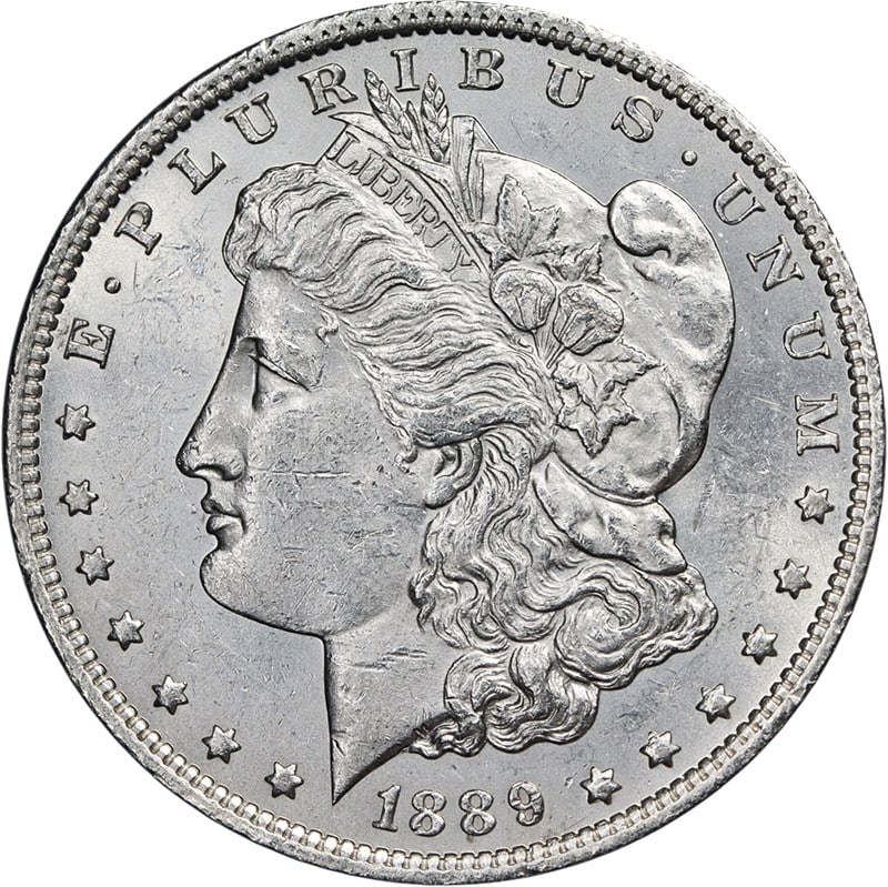 Uncirculated 1889-O Silver Morgan Dollar with Attractive Luster and Strike: Uncirculated 1889-O Silver Morgan Dollar with Attractive Luster and Strike This 1889-O Morgan Silver Dollar is uncirculated and features attractive luster, a strong strike, and pleasing surfaces. The