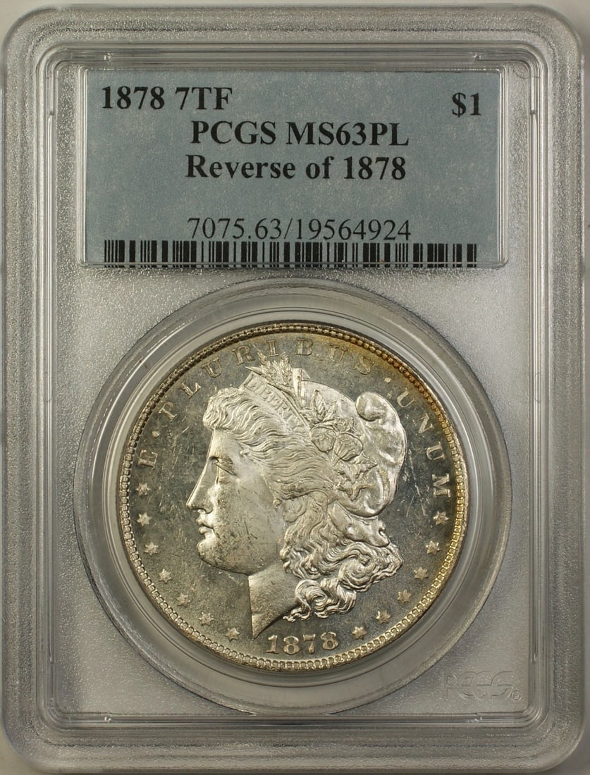 PCGS MS-63PL 1878 Morgan Dollar 7 Tail Feathers Reverse of 1878 Silver Coin: PCGS MS-63PL 1878 Morgan Dollar 7 Tail Feathers Reverse of 1878 Silver Coin This 1878 Morgan Silver Dollar features the 7 Tail Feathers (7TF) design and the Reverse of 1878. Certified by PCGS as MS-63