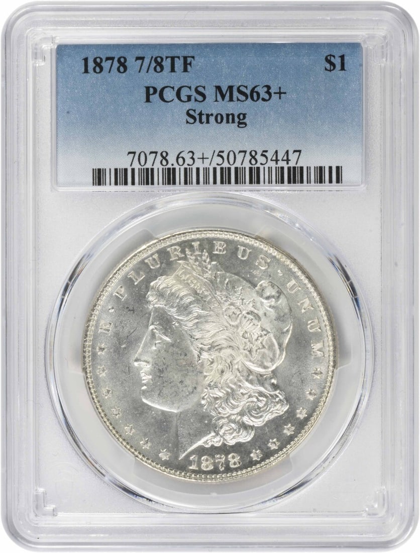 1878 Morgan Silver Dollar MS63+ PCGS Uncirculated 90% Silver: 1878 Morgan Silver Dollar MS63+ PCGS Uncirculated 90% Silver This 1878 Morgan Silver Dollar is a stunning piece of numismatic history, graded MS63+ by PCGS. Struck in Philadelphia, this coin features