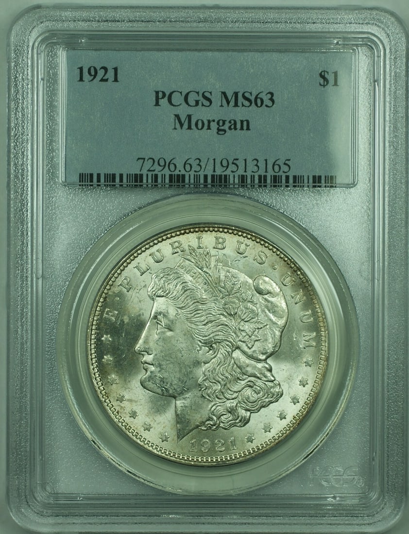 1921 $1 Morgan Silver Dollar PCGS MS-63 Certified Coin: 1921 $1 Morgan Silver Dollar PCGS MS-63 Certified Coin This is a 1921 Morgan Silver Dollar from the United States, certified by PCGS with a grade of MS-63. The coin is uncirculated and composed of 90%