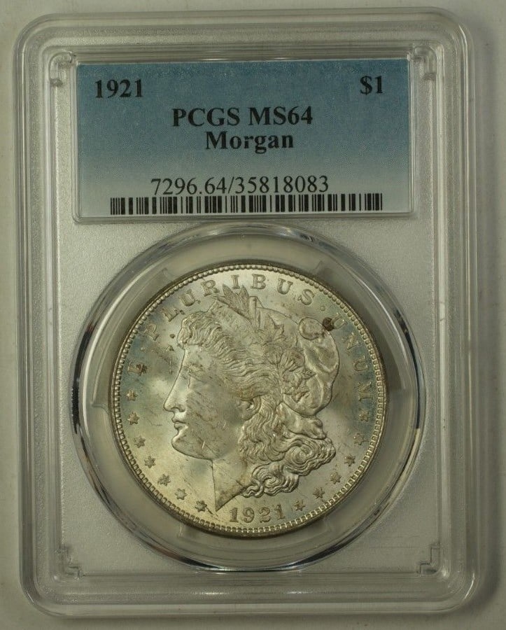 1921 Morgan Dollar Silver $1 Philadelphia PCGS MS-64 Uncirculated Coin: 1921 Morgan Dollar Silver $1 Philadelphia PCGS MS-64 Uncirculated Coin This 1921 US Morgan Silver Dollar is certified by PCGS with a grade of MS-64, indicating a very choice uncirculated condition. Mi