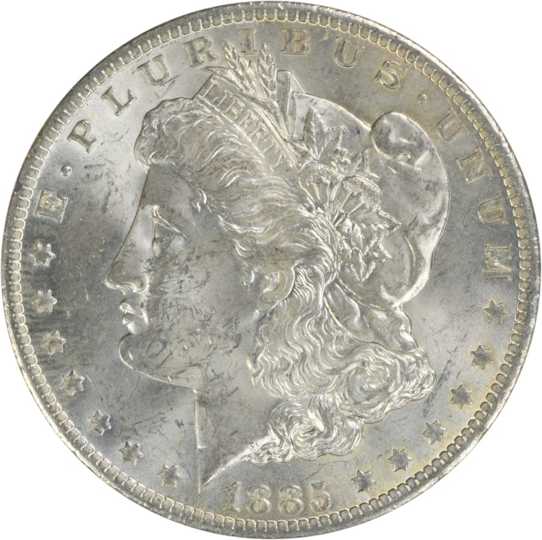 1885-O Morgan Silver Dollar Uncertified Brilliant Uncirculated Coin: 1885-O Morgan Silver Dollar Uncertified Brilliant Uncirculated Coin This 1885-O Morgan Silver Dollar is a stunning piece, classified as Uncirculated and in Brilliant Uncirculated (BU) condition. Minte