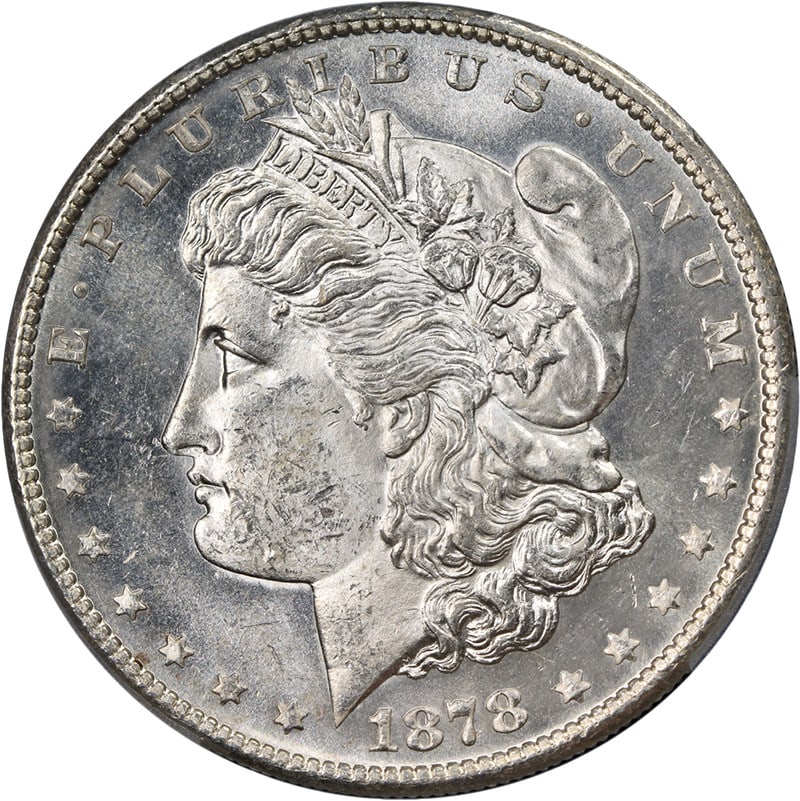 1878-S Morgan Silver Dollar PCGS MS63 Blast White Uncirculated Coin: 1878-S Morgan Silver Dollar PCGS MS63 Blast White Uncirculated Coin This 1878-S Morgan Silver Dollar, graded MS63 by PCGS, exhibits exceptional eye appeal with a brilliant blast white finish. The coin