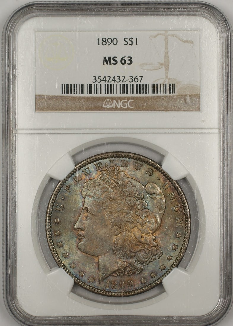 NGC MS-63 1890 Silver Morgan Dollar with Attractive Toning: NGC MS-63 1890 Silver Morgan Dollar with Attractive Toning This 1890 Morgan Silver Dollar features attractive toning on both the obverse and reverse. Certified by NGC with a grade of MS 63, this uncir