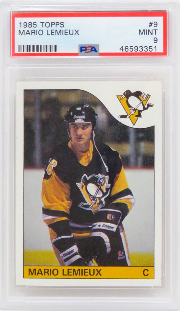 Mario Lemieux 1985 Topps RC Rookie Card #9 PSA 9 Mint: Mario Lemieux 1985 Topps RC Rookie Card #9 PSA 9 Mint This listing features a Mario Lemieux Pittsburgh Penguins 1985 Topps rookie trading card #9, encapsulated and graded Mint 9 by PSA. Mario Lemieux