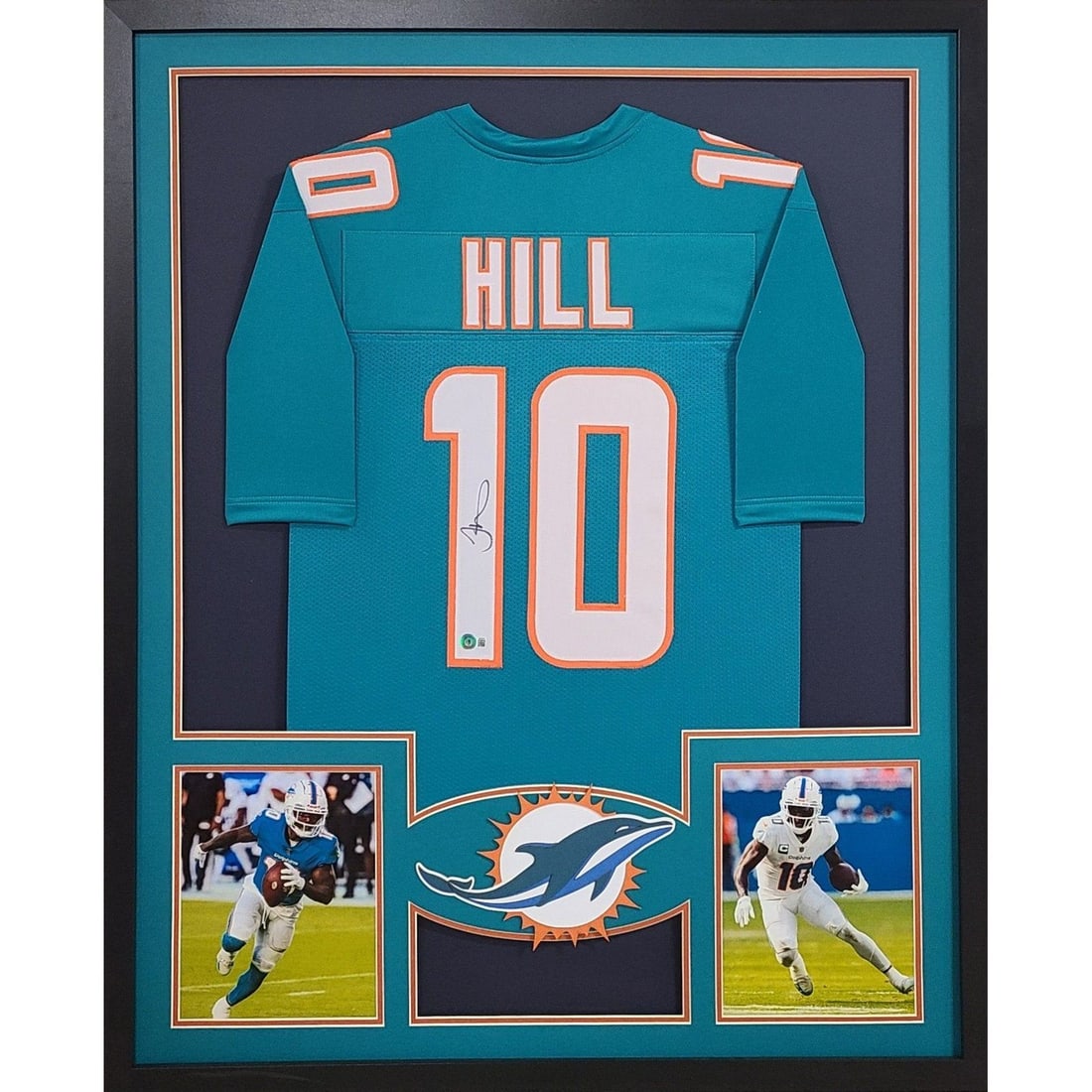 Tyreek Hill Signed Framed Jersey Miami Dolphins Beckett Authenticated: Tyreek Hill Signed Framed Jersey Miami Dolphins Beckett Authenticated This is an autographed Tyreek Hill framed jersey, showcasing exceptional detail in its framing and logo. Authenticated by Beckett,