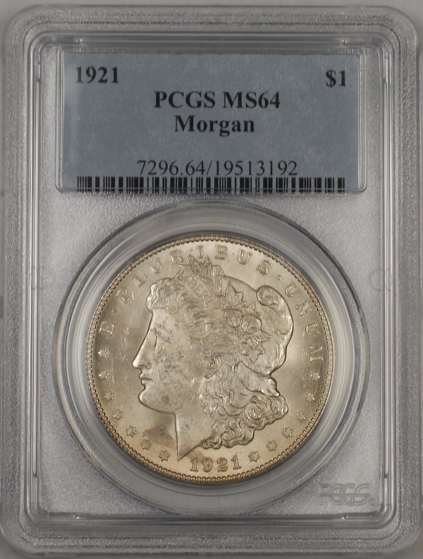 PCGS MS-64 1921 Philadelphia Morgan Dollar Uncirculated $1 Silver Coin: PCGS MS-64 1921 Philadelphia Morgan Dollar Uncirculated $1 Silver Coin This 1921 Morgan Silver Dollar is certified by PCGS with a grade of MS-64. Struck at the Philadelphia Mint, it is composed of 90%