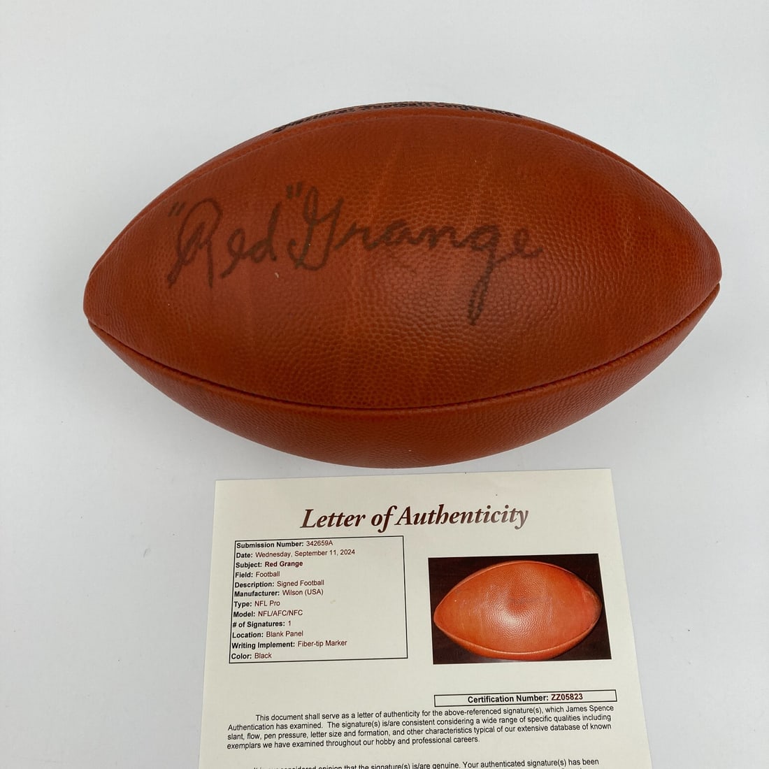 Red Grange Autographed Wilson NFL Football with JSA COA: Red Grange Autographed Wilson NFL Football with JSA COA This is an authentic Wilson NFL football autographed by legendary player Red Grange. The football is fully inflated and holds air, making it per