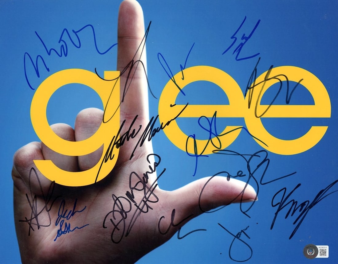 Glee Cast 11x14 Signed Photo with 14 Autographs Beckett Authenticated: Glee Cast 11x14 Signed Photo with 14 Autographs Beckett Authenticated Celebrate the iconic cast of Glee with this autographed 11x14 photograph featuring an impressive 14 signatures. This original piec