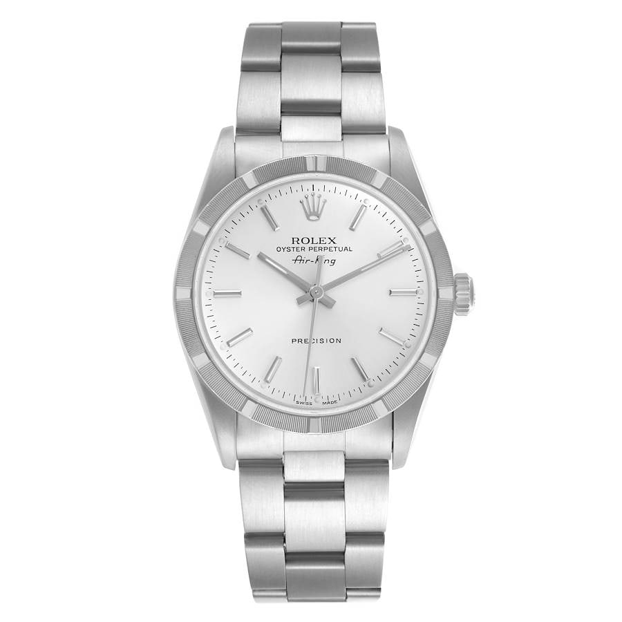 Rolex 14010 Air-King Oyster Bracelet Silver Dial Watch with Papers 2002: Rolex 14010 Air-King Oyster Bracelet Silver Dial Watch with Papers 2002 This Rolex Air-King features a silver dial and an engine-turned bezel, complemented by an Oyster bracelet. The watch is presente