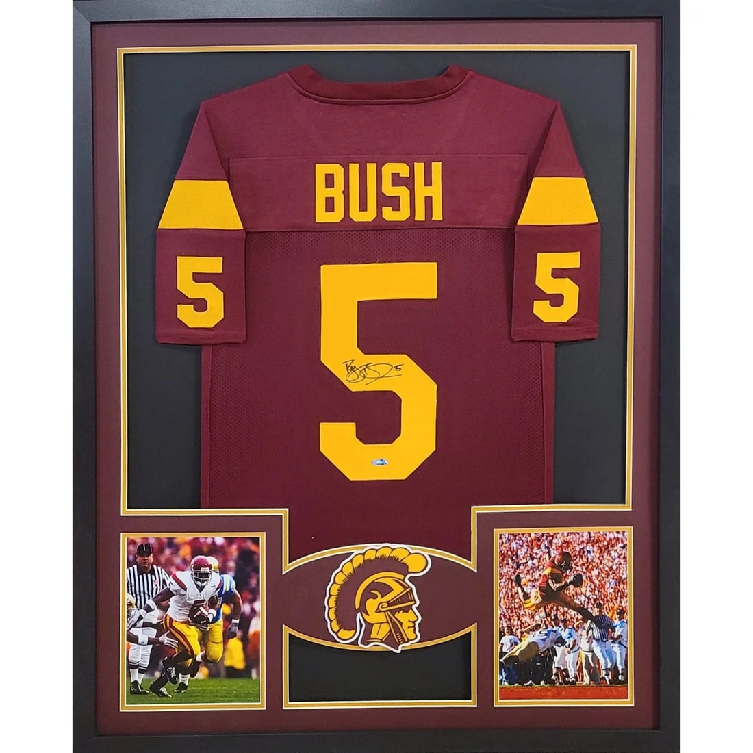 Reggie Bush Autographed Framed Jersey Tristar Authentication USC: Reggie Bush Autographed Framed Jersey Tristar Authentication USC This stunning framed jersey features the autograph of Reggie Bush, a standout player from USC Southern Cal. Authenticated by Tristar, a