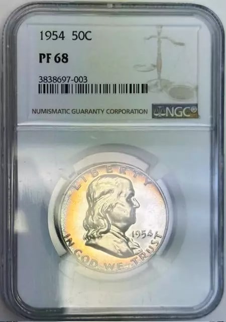 1954 Franklin Half Dollar NGC PF 68 Proof Silver Coin: 1954 Franklin Half Dollar NGC PF 68 Proof Silver Coin This 1954 Franklin Half Dollar is certified by NGC with a remarkable grade of PF 68, indicating its exceptional proof quality. Struck in silver, t