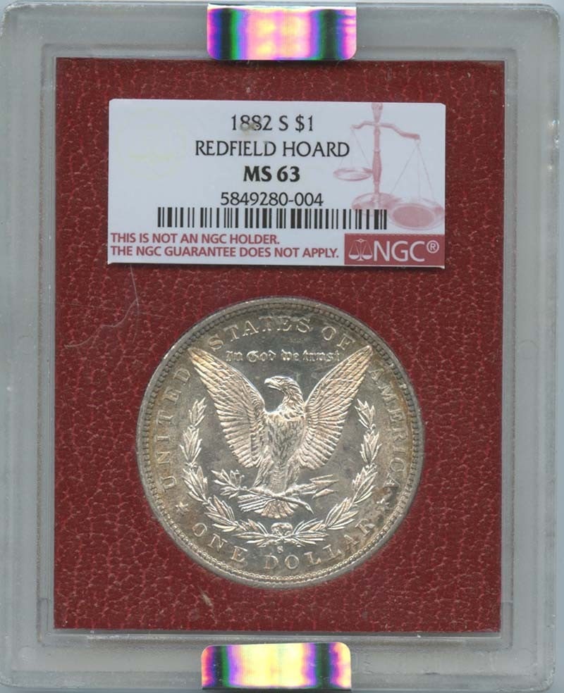 1882-S Morgan Dollar NGC MS63 Redfield Hoard San Francisco: 1882-S Morgan Dollar NGC MS63 Redfield Hoard San Francisco This 1882-S Morgan Dollar, part of the Redfield Hoard, is certified by NGC with a grade of MS63, indicating it is uncirculated and in excelle
