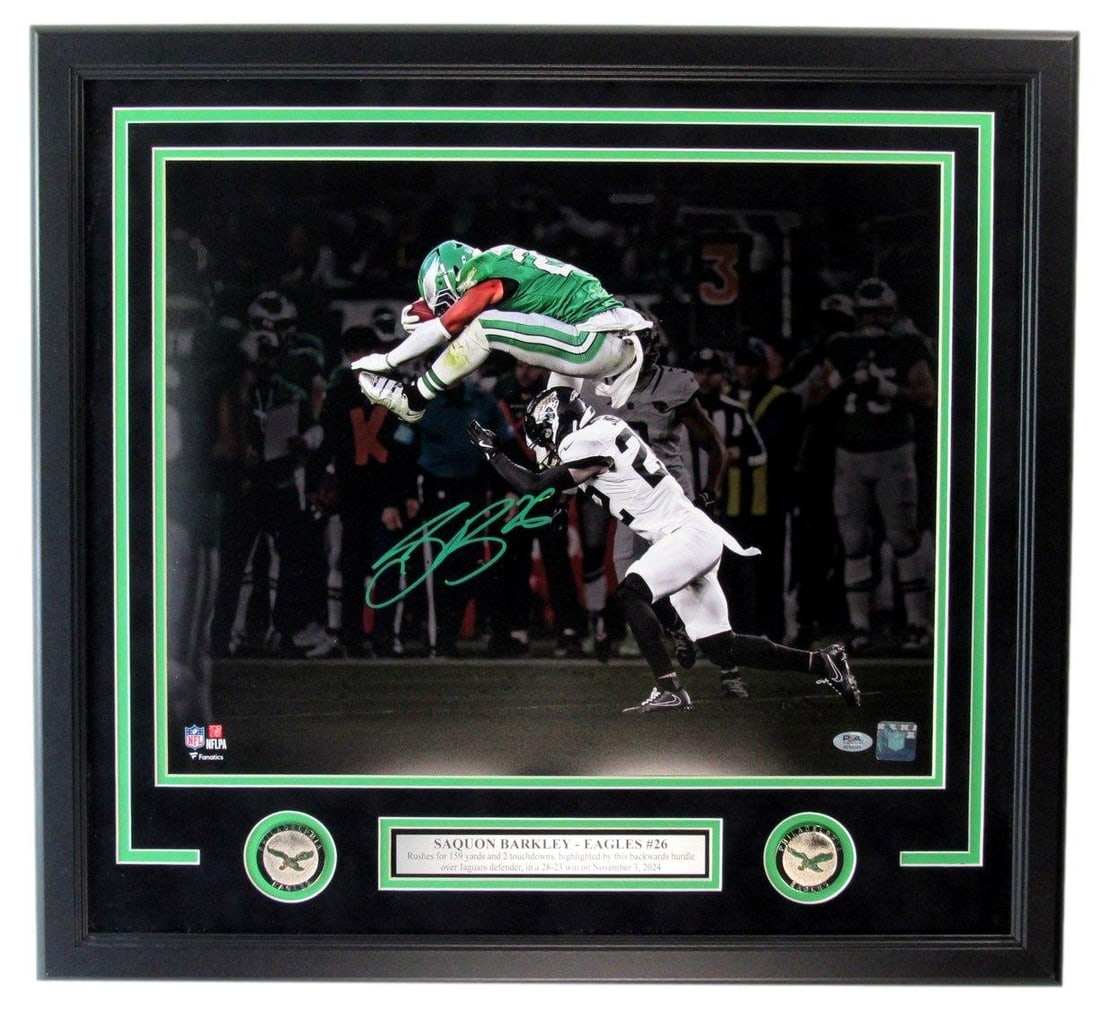 Framed 16x20 Saquon Barkley Eagles Signed Photo PSA DNA Authenticated: Framed 16x20 Saquon Barkley Eagles Signed Photo PSA DNA Authenticated Enhance your collection with this remarkable autographed 16x20 photo of NFL superstar Saquon Barkley, captured in his iconic leap.