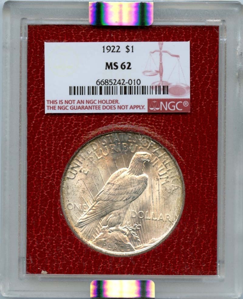 1922 Peace Dollar S$1 NGC MS62 Uncirculated Philadelphia: 1922 Peace Dollar S$1 NGC MS62 Uncirculated Philadelphia This 1922 Peace Dollar, graded MS62 by NGC, is a remarkable addition to any numismatic collection. Featuring the iconic design symbolizing peac