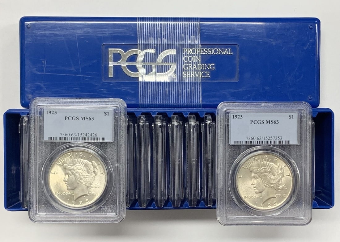 Roll of 20 1923 Peace Silver Dollars PCGS MS 63 Certified Coins: Roll of 20 1923 Peace Silver Dollars PCGS MS 63 Certified Coins This lot includes twenty 1923 Peace Silver Dollars, each graded MS 63 by PCGS. These uncirculated coins are composed of silver and were