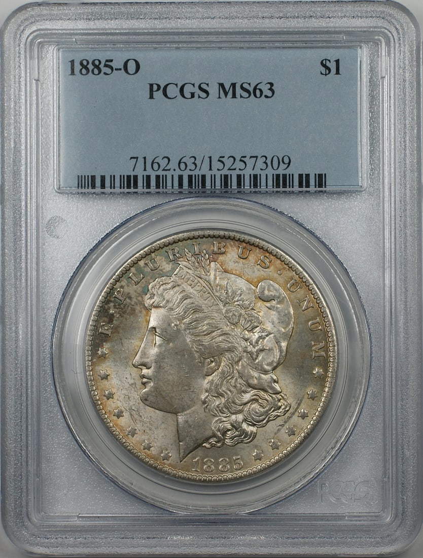 PCGS MS63 1885-O Morgan Dollar New Orleans Silver Toned Coin: PCGS MS63 1885-O Morgan Dollar New Orleans Silver Toned Coin This 1885-O Morgan Silver Dollar is graded MS 63 by PCGS and features attractive toning. Minted in New Orleans, this uncirculated coin is c